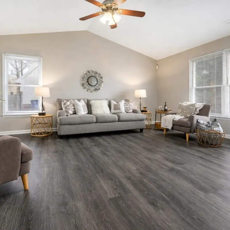 Modern living room with waterproof hybrid flooring in Melbourne.