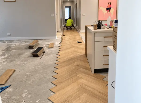 An ongoing flooring installation service work in an Australian home by Jim's Flooring.